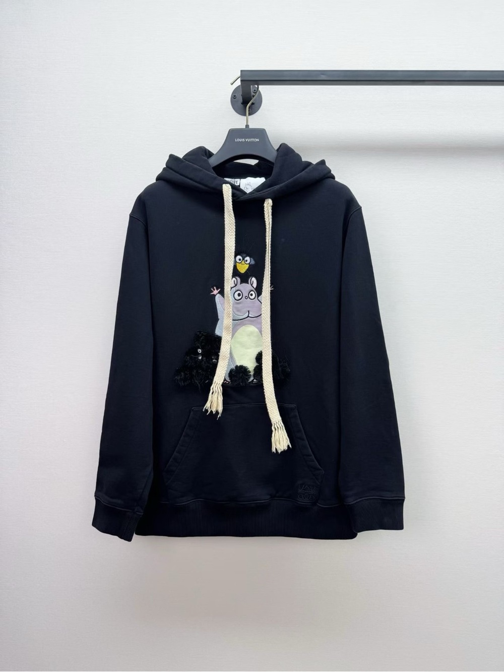 Loewe Black Crewneck Hoodie with Cream Drawstrings and Embroidered Character